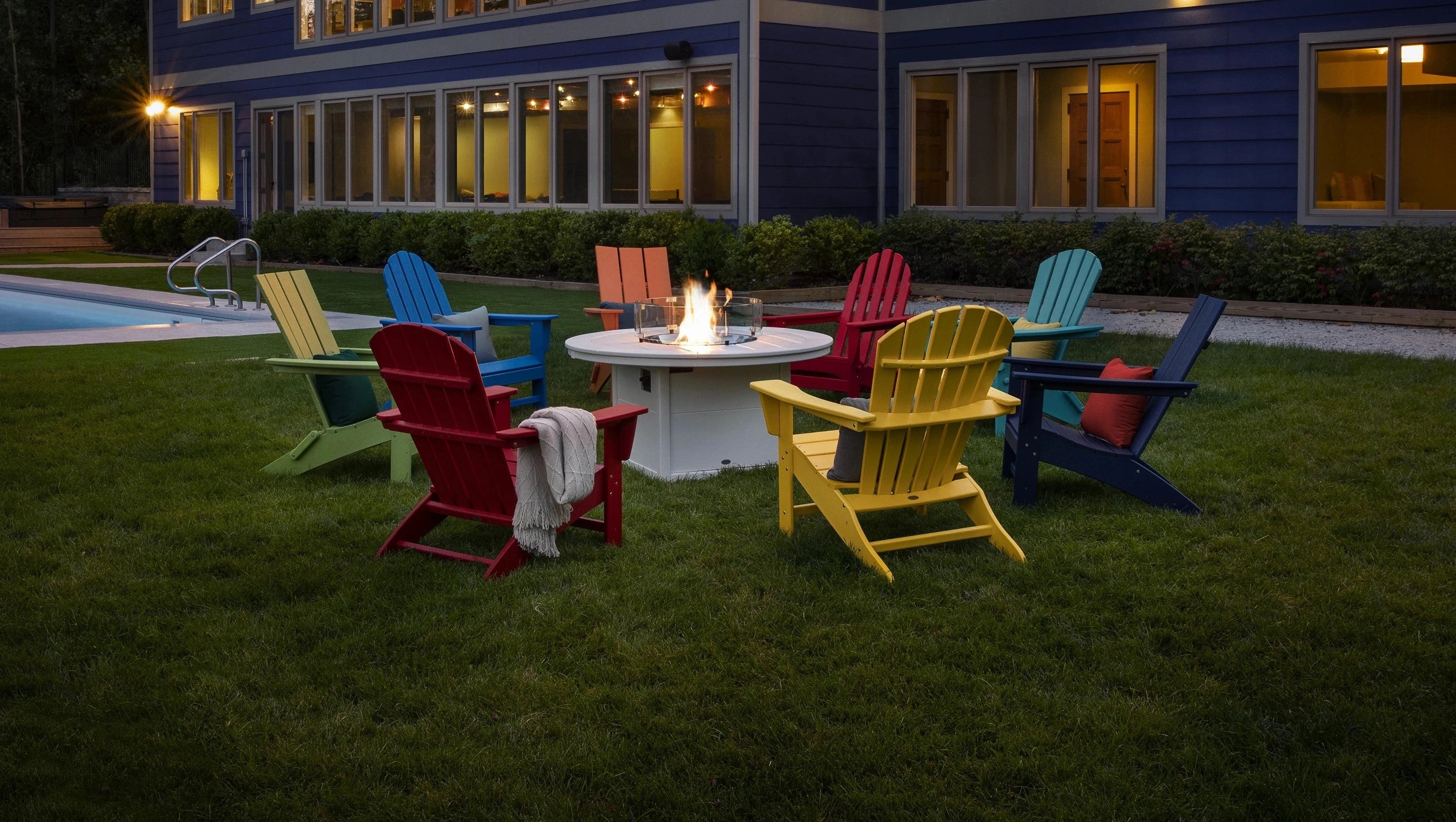 Adirondack chairs around a fire pit